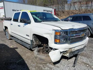 2014 Chevrolet Silverado 1500 High Country with VIN 3GCUKTEJ7EG372338, listed as a IAAI auction lot 41849096 with 69,010 mi miles and . Bid and sale history available at DreamBid. Image 1.