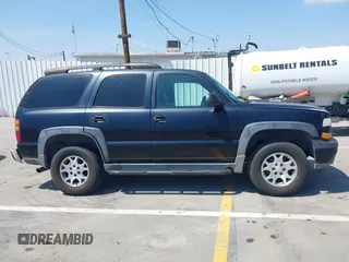 2001 Chevrolet Tahoe LT with VIN 1GNEK13T41R197657, listed as a IAAI auction lot 42164367 with 200,507 mi miles. Bid and sale history available at carsss.com. Image 13.