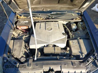 2006 Cadillac CTS with VIN 1G6DM57T060106608, listed as a IAAI auction lot 41233161 with 141,503 mi miles. Bid and sale history available at carsss.com. Image 10.