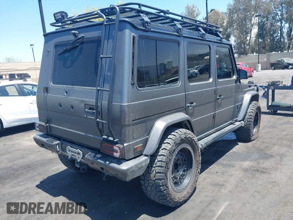 2014 Mercedes-Benz G 63 AMG with VIN WDCYC7DF7EX220956, listed as a IAAI auction lot 42272984 with 129,893 mi miles and . Bid and sale history available at DreamBid. Image 4.