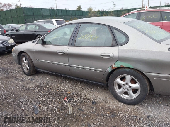 2004 Ford Taurus SE z VIN 1FAFP53U74A135287, wystawiony jako IAAI lot #40756396 z przebiegiem 141 483 mil mil oraz . Historia ofert i sprzedaży dostępna na DreamBid. Obrazek 6.