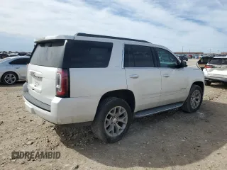 2019 GMC Yukon SLT with VIN 1GKS1BKC5KR329417, listed as a Copart auction lot 47275605 with 67,164 mi miles and Salvage Title. Bid and sale history available at carsss.com. Image 3.
