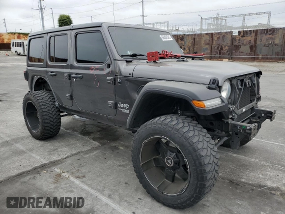 2019 Jeep Wrangler Unlimited Sport S with VIN 1C4HJXDG5KW535115, listed as a Copart auction lot 58404545 with 95,491 mi miles and Salvage title. Bid and sale history available at DreamBid. Image 4.