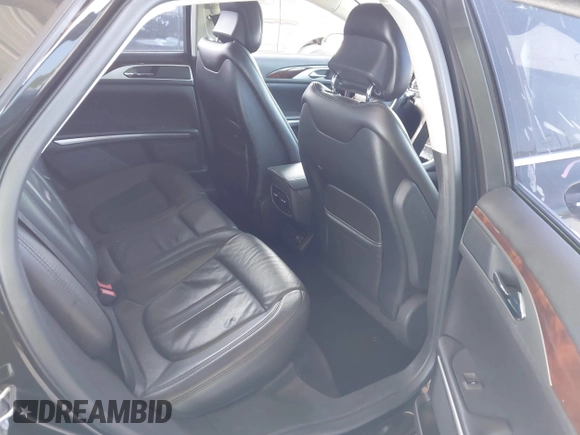 2014 Lincoln MKZ Hybrid z VIN 3LN6L2LU5ER831041, wystawiony jako IAAI lot #42447895 z przebiegiem 92 102 mil mil oraz . Historia ofert i sprzedaży dostępna na DreamBid. Obrazek 8.