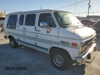 1994 Chevrolet Chevy Van z VIN 1GBEG25K9RF182710, wystawiony jako Copart lot #79284544 z przebiegiem 178 640 mil mil oraz Czysty tytuł • Clean title. Historia ofert i sprzedaży dostępna na DreamBid. Obrazek 4.