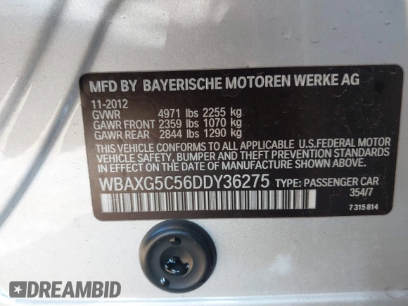 2013 BMW 5 Series 528i with VIN WBAXG5C56DDY36275, listed as a IAAI auction lot 41881102 with 104,022 mi miles and . Bid and sale history available at carsss.com. Image 9.