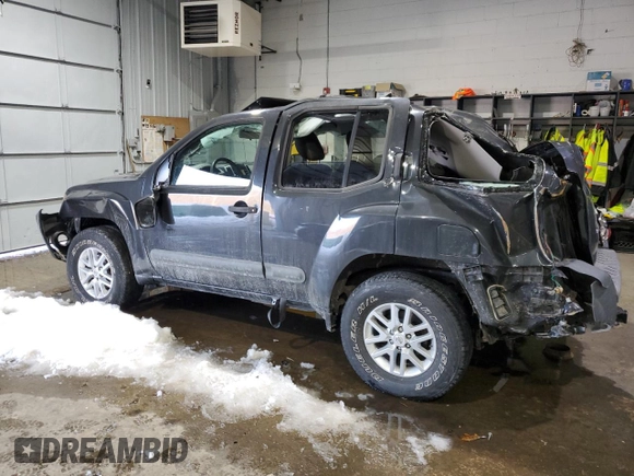 2014 Nissan Xterra S with VIN 5N1AN0NU7EN805632, listed as a Copart auction lot 44171325 with 101,260 mi miles and Salvage title. Bid and sale history available at DreamBid. Image 2.