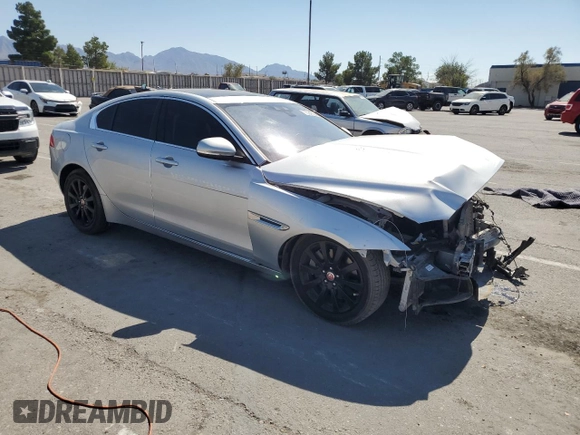 2019 Jaguar XE 25t with VIN SAJAR4FX6KCP49670, listed as a Copart auction lot 75340594 with 71,282 mi miles and Salvage Title. Bid and sale history available at carsss.com. Image 4.