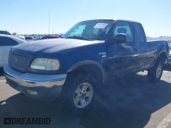 2003 Ford F-150 XL with VIN 1FTRX18WX3NA22323, listed as a IAAI auction lot 41635869 with 129,029 mi miles. Bid and sale history available at carsss.com. Image 17.