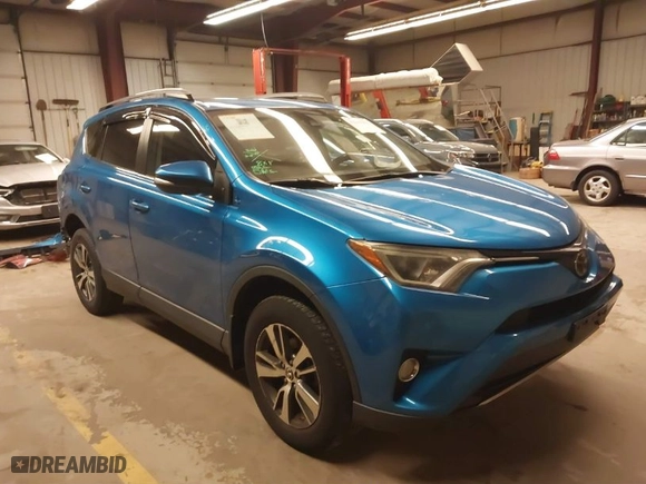 2018 Toyota RAV4 XLE with VIN JTMRFREV4JJ238654, listed as a IAAI auction lot 41215992 with 150,528 mi miles. Bid and sale history available at carsss.com. Image 1.