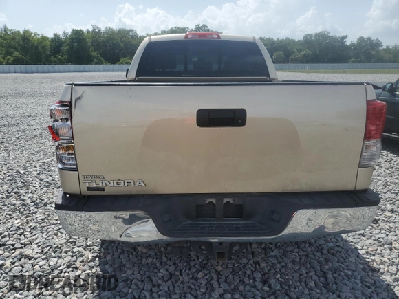 2010 Toyota Tundra с VIN 5TFRY5F14AX093529, выставлен на аукционе Copart как лот 60121455 с пробегом 174 997 миль миль и Списание • Salvage title. История ставок и продаж доступна на DreamBid. Изображение 6.