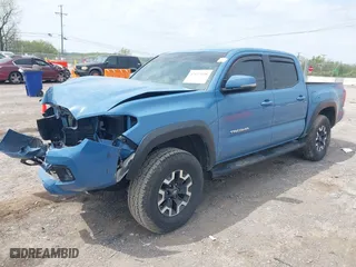 2019 Toyota Tacoma 4WD SR with VIN 3TMCZ5AN0KM260201, listed as a IAAI auction lot 42017048 with 49,216 mi miles. Bid and sale history available at carsss.com. Image 18.