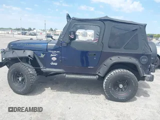 1997 Jeep Wrangler Sport with VIN 1J4FY19S2VP481780, listed as a IAAI auction lot 41822213 with 156,629 mi miles. Bid and sale history available at carsss.com. Image 6.