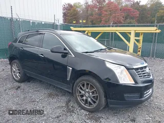 2015 Cadillac SRX z VIN 3GYFNAE30FS515953, wystawiony jako IAAI lot #40562508 z przebiegiem 163 112 mil mil oraz . Historia ofert i sprzedaży dostępna na DreamBid. Obrazek 1.