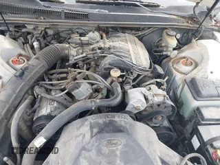 1990 Ford Thunderbird z VIN 1FAPP604XLH213209, wystawiony jako IAAI lot #42367380 z przebiegiem 33 382 mil mil oraz . Historia ofert i sprzedaży dostępna na DreamBid. Obrazek 6.