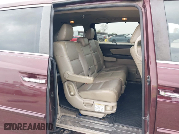 2012 Honda Odyssey EX-L with VIN 5FNRL5H61CB108301, listed as a IAAI auction lot 41939536 with 225,476 mi miles and . Bid and sale history available at DreamBid. Image 8.