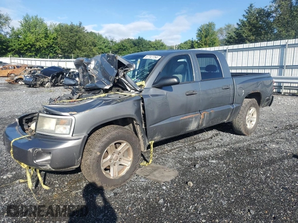 2010 Dodge Dakota Bighorn/Lonestar z VIN 1D7CE3GK0AS228194, wystawiony jako Copart lot #67747754 z przebiegiem 163 139 mil mil oraz Szkoda całkowita • Salvage title. Historia ofert i sprzedaży dostępna na DreamBid. Obrazek 1.