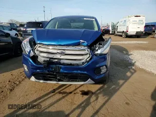 2019 Ford Escape SE z VIN 1FMCU9GDXKUB24265, wystawiony jako Copart lot #54052855 z przebiegiem 60 479 mil mil oraz Czysty tytuł • Clean title. Historia ofert i sprzedaży dostępna na DreamBid. Obrazek 14.