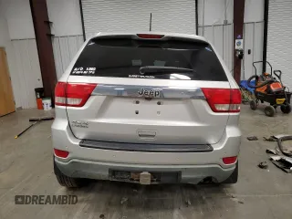 2011 Jeep Grand Cherokee Laredo z VIN 1J4RR4GGXBC609891, wystawiony jako Copart lot #52089645 z przebiegiem 180 895 mil mil oraz Szkoda całkowita • Salvage title. Historia ofert i sprzedaży dostępna na DreamBid. Obrazek 6.