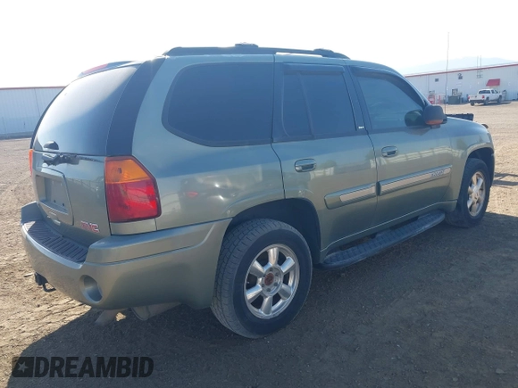 2003 GMC Envoy SLT with VIN 1GKDT13S932373739, listed as a IAAI auction lot 42122017 with 155,963 mi miles. Bid and sale history available at carsss.com. Image 4.