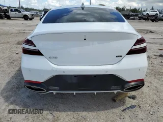 2023 Genesis G70 3.3T with VIN KMTG54TEXPU105082, listed as a Copart auction lot 65000724 with 12,941 mi miles and Salvage Title. Bid and sale history available at carsss.com. Image 6.