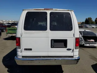 1999 Ford Econoline Wagon XL z VIN 1FBSS31SXXHB17170, wystawiony jako Copart lot #70482974 z przebiegiem 86 575 mil mil oraz Czysty tytuł • Clean title. Historia ofert i sprzedaży dostępna na DreamBid. Obrazek 6.