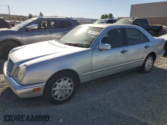 1998 Mercedes-Benz E 320 with VIN WDBJF25F9WA697018, listed as a Copart auction lot 87567315 with 107,255 mi miles and Clean Title. Bid and sale history available at DreamBid. Image 1.