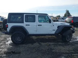 2023 Jeep Wrangler Sport with VIN 1C4HJXDG4PW567027, listed as a IAAI auction lot 41633197 with 14,782 mi miles and . Bid and sale history available at DreamBid. Image 14.
