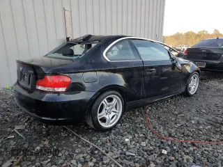 2010 BMW 1 Series 128i with VIN WBAUP9C5XAVL89207, listed as a Copart auction lot 80018904 with 124,842 mi miles and Salvage Title. Bid and sale history available at DreamBid. Image 3.