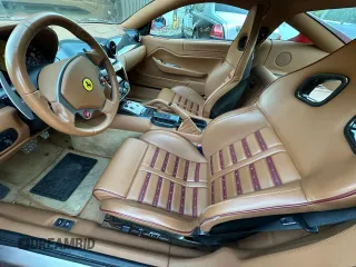 2007 Ferrari 599 z VIN ZFFFC60A870153007, wystawiony jako Copart lot #87106644 z przebiegiem 13 264 mil mil oraz Tytuł czysty. Historia ofert i sprzedaży dostępna na DreamBid. Obrazek 9.