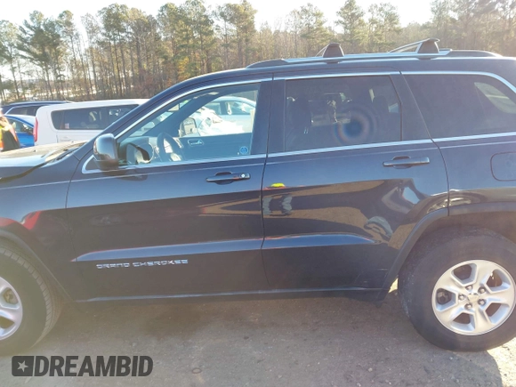 2014 Jeep Grand Cherokee Laredo with VIN 1C4RJEAG3EC218128, listed as a IAAI auction lot 40951611 with 119,596 mi miles and . Bid and sale history available at DreamBid. Image 14.