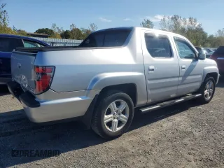 2012 Honda Ridgeline RTL with VIN 5FPYK1F55CB452206, listed as a Copart auction lot 74694204 with 128,226 mi miles and Clean Title. Bid and sale history available at carsss.com. Image 3.