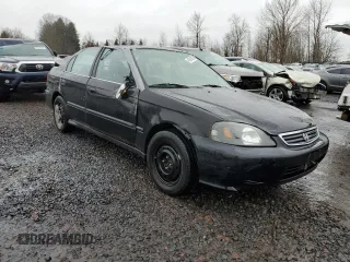 2000 Honda Civic LX with VIN JHMEJ6675YS001797, listed as a Copart auction lot 45910085 with 71,199 mi miles and Clean Title. Bid and sale history available at carsss.com. Image 4.