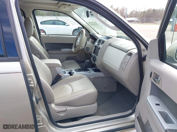 2010 Mercury Mariner Premier with VIN 4M2CN8HG4AKJ05736, listed as a IAAI auction lot 41744987 with 209,819 mi miles. Bid and sale history available at carsss.com. Image 5.