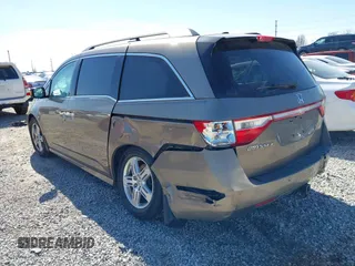 2012 Honda Odyssey Touring with VIN 5FNRL5H9XCB110672, listed as a IAAI auction lot 41826895 with 159,927 mi miles. Bid and sale history available at carsss.com. Image 3.