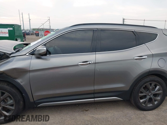 2018 Hyundai Santa Fe Ultimate with VIN 5NMZWDLAXJH100108, listed as a IAAI auction lot 42126768 with 68,325 mi miles and . Bid and sale history available at DreamBid. Image 14.
