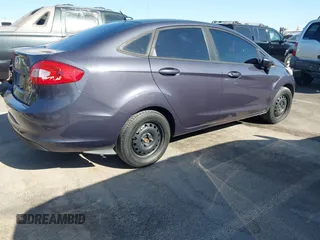 2012 Ford Fiesta S with VIN 3FADP4AJ4CM187553, listed as a IAAI auction lot 41965362 with 136,021 mi miles. Bid and sale history available at carsss.com. Image 4.