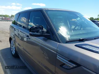 2015 Land Rover Range Rover Sport HSE z VIN SALWR2VF1FA531194, wystawiony jako IAAI lot #42344714 z przebiegiem 130 981 mil mil oraz . Historia ofert i sprzedaży dostępna na DreamBid. Obrazek 13.