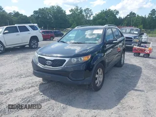 2013 Kia Sorento LX with VIN 5XYKT4A23DG310439, listed as a IAAI auction lot 42546201 with 234,287 mi miles and . Bid and sale history available at DreamBid. Image 2.
