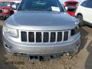 2016 Jeep Grand Cherokee Limited 75th Anniversary with VIN 1C4RJFBG5GC401277, listed as a IAAI auction lot 41119644 with 156,658 mi miles and . Bid and sale history available at DreamBid. Image 13.