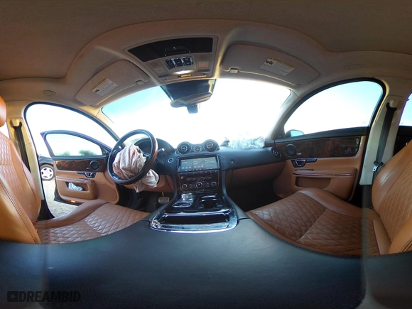 2018 Jaguar XJ with VIN SAJWJ2GD3J8W15092, listed as a IAAI auction lot 41844106 with 56,357 mi miles. Bid and sale history available at carsss.com. Image 18.