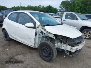 2014 Mazda 2 Sport z VIN JM1DE1KZ6E0182458, wystawiony jako IAAI lot #42298020 z przebiegiem 123 560 mil mil oraz . Historia ofert i sprzedaży dostępna na DreamBid. Obrazek 1.
