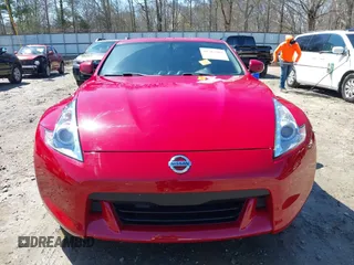 2009 Nissan 370Z Touring with VIN JN1AZ44E69M405179, listed as a IAAI auction lot 41762303 with 132,853 mi miles and . Bid and sale history available at DreamBid. Image 13.