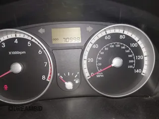 2009 Hyundai Accent Auto GLS with VIN KMHCN46C89U306436, listed as a IAAI auction lot 42010992 with 70,998 mi miles. Bid and sale history available at carsss.com. Image 7.