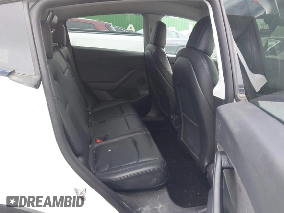 2022 Tesla Model Y Long Range z VIN 7SAYGDEE7NF389788, wystawiony jako IAAI lot #42014111 z przebiegiem 37 606 mil mil oraz . Historia ofert i sprzedaży dostępna na DreamBid. Obrazek 8.