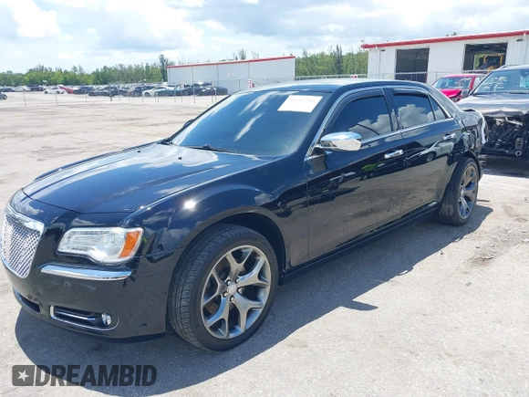 2014 Chrysler 300 C with VIN 2C3CCAKT9EH171614, listed as a IAAI auction lot 39747704 with 129,156 mi miles and . Bid and sale history available at carsss.com. Image 2.