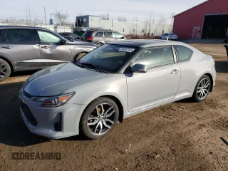 2014 Scion tC with VIN JTKJF5C7XE3086652, listed as a Copart auction lot 46542145 with 216,577 mi miles and Salvage Title. Bid and sale history available at carsss.com. Image 1.