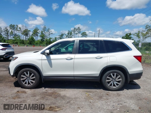 2019 Honda Pilot EX-L with VIN 5FNYF5H42KB026108, listed as a IAAI auction lot 42387593 with 112,556 mi miles and . Bid and sale history available at DreamBid. Image 14.