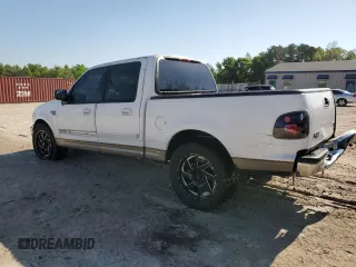 2001 Ford F-150 XLT with VIN 1FTRW07W11KB44405, listed as a Copart auction lot 53560595 with 272,881 mi miles and Salvage title. Bid and sale history available at DreamBid. Image 2.