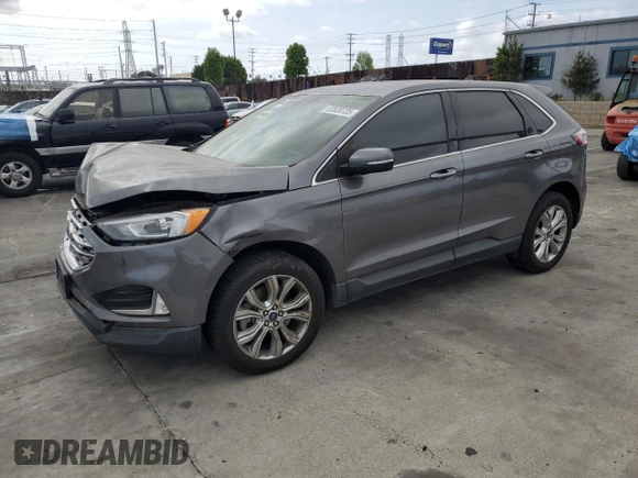 2021 Ford Edge Titanium with VIN 2FMPK4K96MBA16599, listed as a Copart auction lot 53920735 with 71,376 mi miles and Salvage title. Bid and sale history available at DreamBid. Image 1.